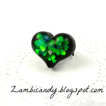 Adjustable sparkly black and green heart ring