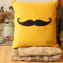 Moustache_cushion_yellow_-_%c2%a330_medium
