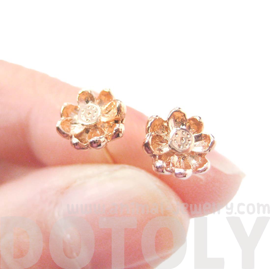 Textured Floral Flower Shaped Stud Earrings in Rose Gold · DOTOLY