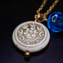 Carved Atlantic Coin and Blue Lucite Necklace