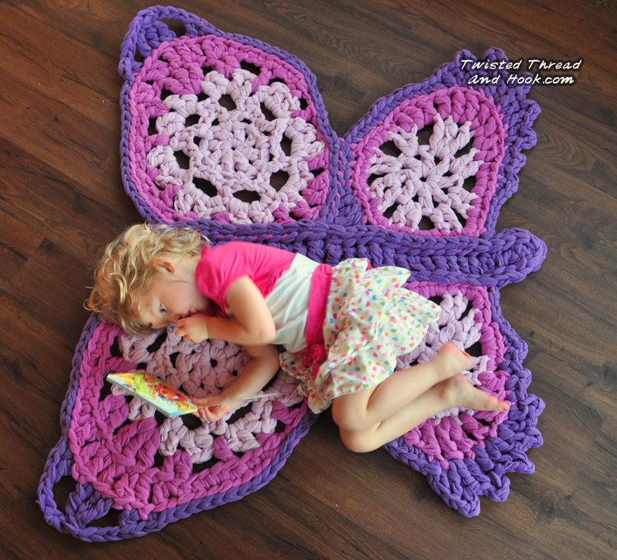 http://twistedthreadandhook.storenvy.com/products/2425533-purple-butterfly-rug-handmade-for-children-room-decor-or-girl-nursery