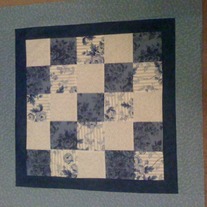 Blue_and_white_floral_quilt_medium
