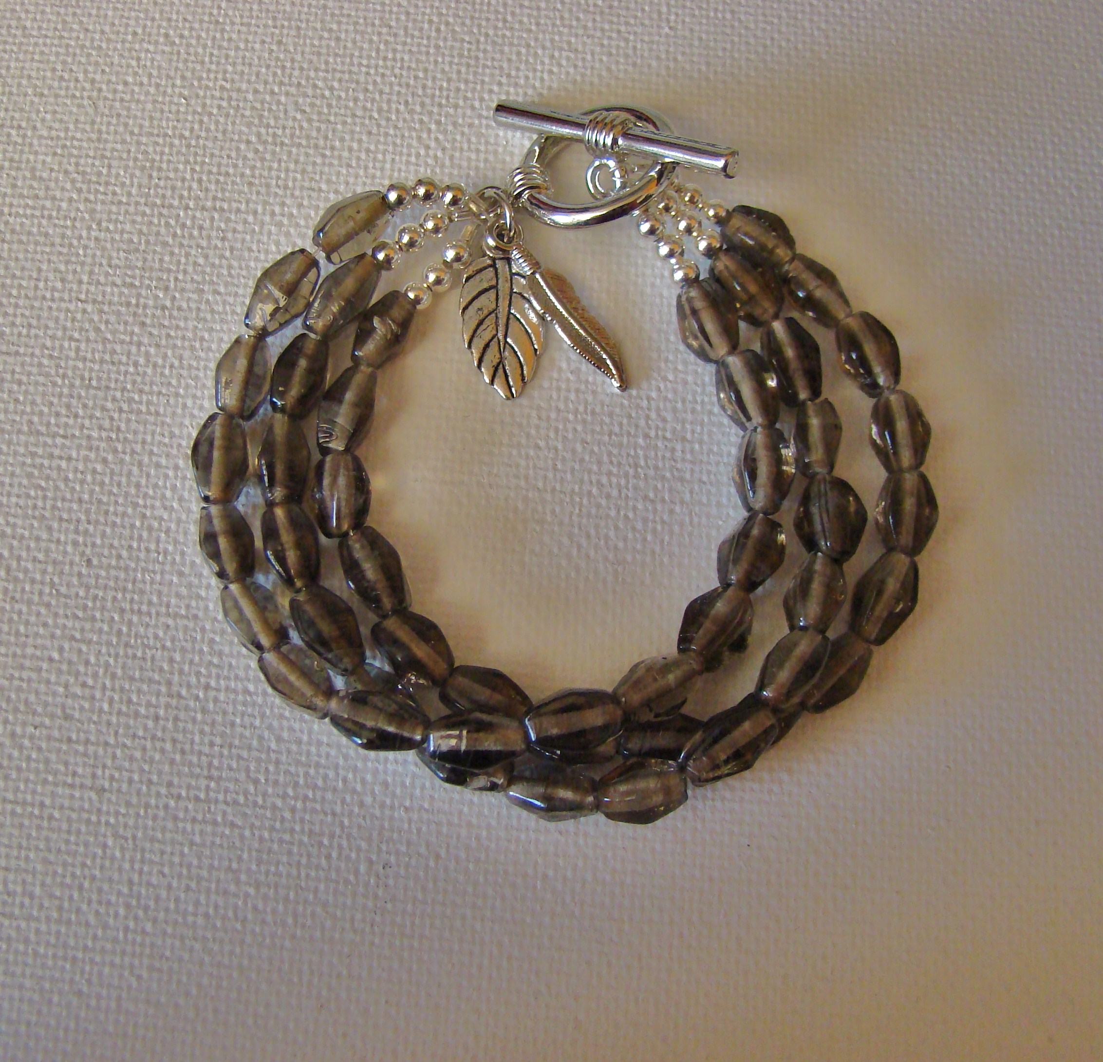 Triple Strand Bracelet with Leaf Charms on Storenvy