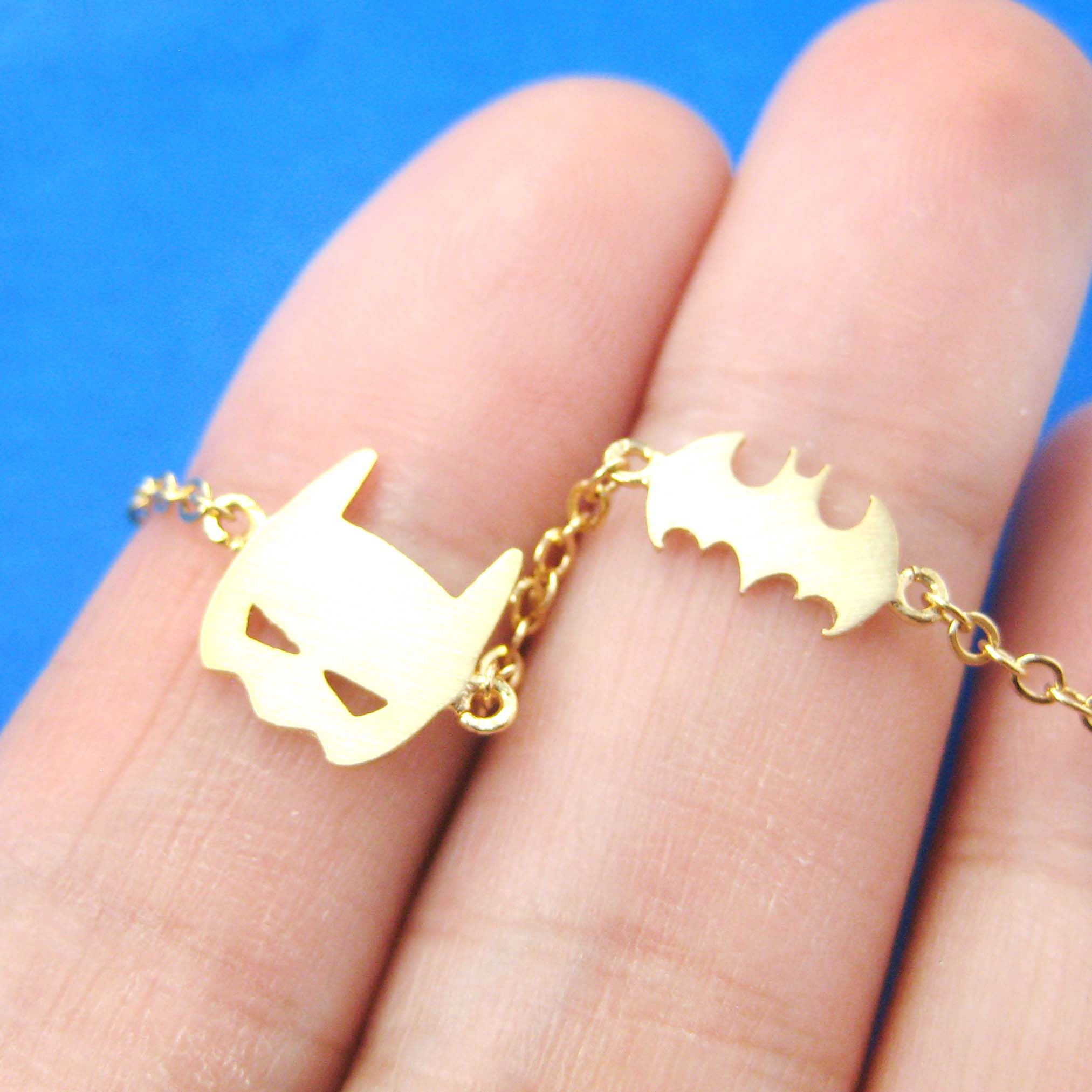 Classic Batman Bat Logo and Bat Mask Shaped Charm Bracelet in Gold · DOTOLY Animal Jewelry · The