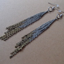 Long two tone earrings.