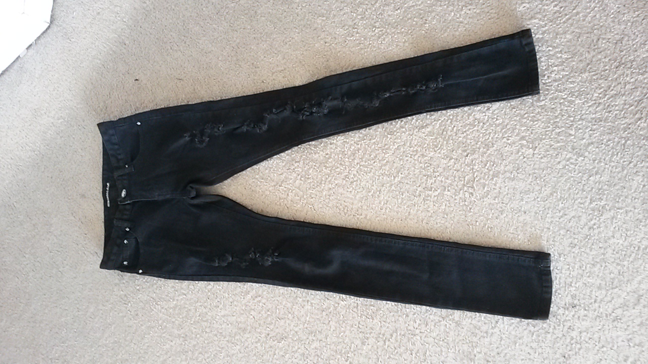 black ripped jeans size 00