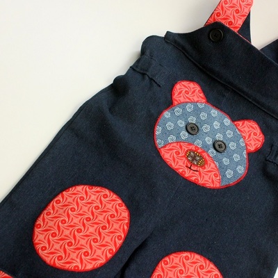 red dungarees baby boy